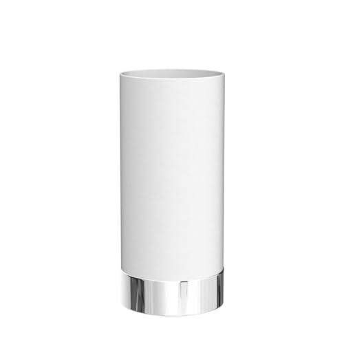 Vase cylindrique blanc avec base argentée.
