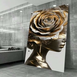 Tableau moderne d'une rose dorée sur un mur.